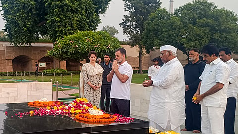 Congress President Mallikarjun Kharge and party leaders Rahul Gandhi, Priyanka Gandhi Vadra and KC Venugopal pay tribute to Mahatma Gandhi during a visit by INDIA bloc leaders at Raj Ghat, in New Delhi, Thursday, Oct. 8, 2026