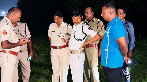 Police officials at the crime scene.