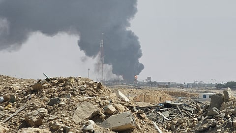 Black smoke and flames rise from an oil facility in an industrial area in southern Riyadh, Saudi Arabia, Saturday, Oct. 3, 2026.