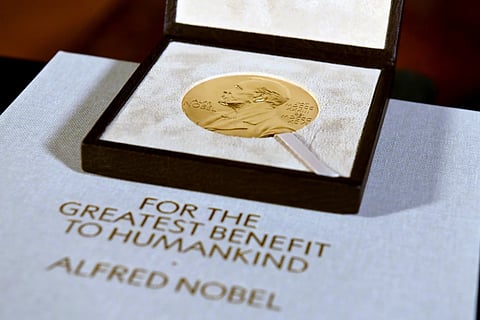 A Nobel diploma and medal are displayed, Dec. 8, 2020, during a ceremony in New York. 