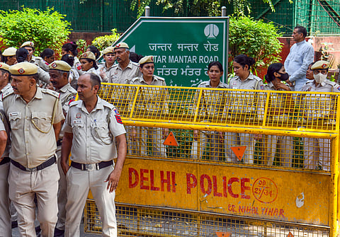  Police personnel deployed near Jantar Mantar in view of a call for protest by the Cockroach Janta Party on (Oct 10), in New Delhi on Friday.