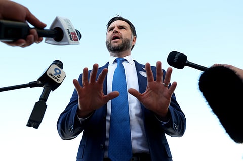 Vice President JD Vance speaks to members of the media at Cincinnati/Northern Kentucky International Airport, Friday, Oct. 9, 2026 in Hebron, Ky., as he departs for a rally in Lima, Ohio