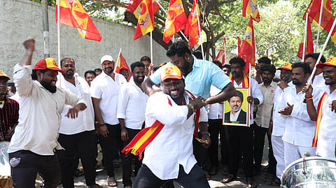 TVK partymen celebrate the victory in the bypolls of two assembly segments, at party headquarters