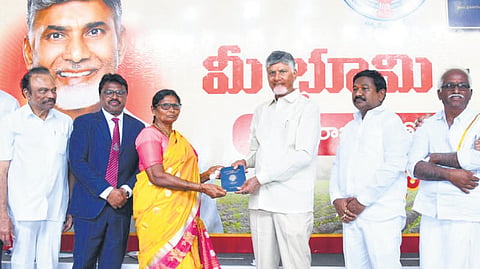 CM Chandrababu Naidu distributes Pattadar Passbooks to farmers at Narasingolu in Prakasam district on Friday.