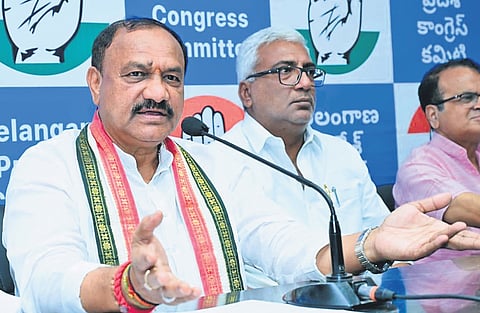TPCC chief B Mahesh Kumar Goud addresses the media at Gandhi Bhavan in Hyderabad on Friday