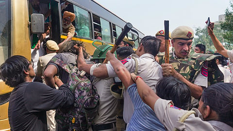 Police personnel detain demonstrators during a demonstration call by the Cockroach Janta Party (CJP) demanding the resignation of Chief Election Commissioner (CEC) Gyanesh Kumar over alleged electoral roll irregularities, in New Delhi, Saturday, Oct. 10, 2026.