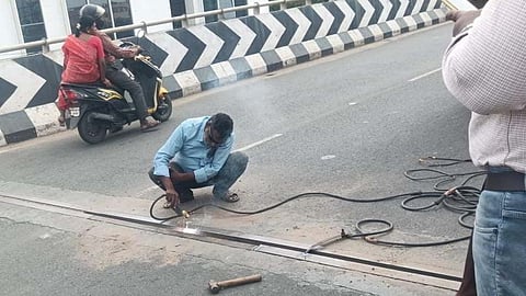 officials from the National Highways wing of the State Highways Department have started repairing the damaged portions of the flyover on Friday.