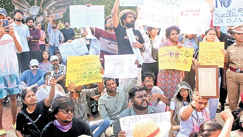 Protesters at Besant Nagar in Chennai demanding the resignation of Chief Election Commissioner Gyanesh Kumar, on Saturday.