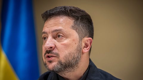 Ukrainian President Volodymyr Zelenskyy speaks to the media after a German-Ukrainian business forum in Kyiv, Ukraine, Sunday, Oct. 4, 2026