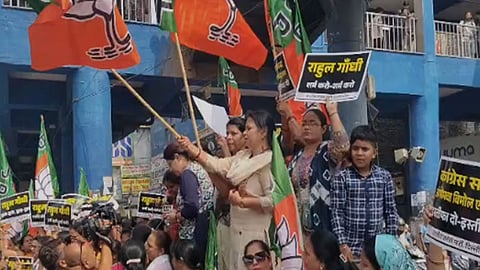 Delhi BJP Mahila Morcha workers detained during protest over sexual harassment allegations against Congress MP and JNU professor.