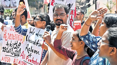 Members of AIDSO along with other students protest against SIR at Freedom Park in Bengaluru on Sunday.