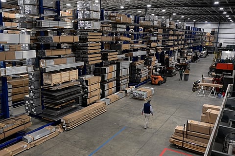 An overview of aluminum profiles and building materials stored at Shapes Unlimited, a US manufacturer facing millions of dollars in additional costs due to President Donald Trump's aluminum tariffs, in North Jackson, Ohio, on September 30 2026.