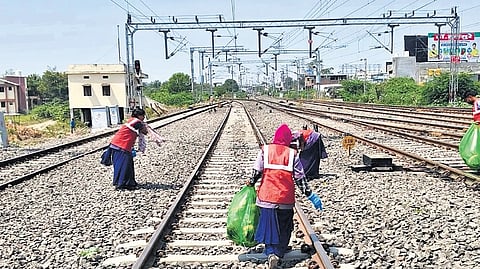 Workers clear railway tracks of waste as part of SCR’s cleanliness drive — Swachhata Hi Seva — in Telangana