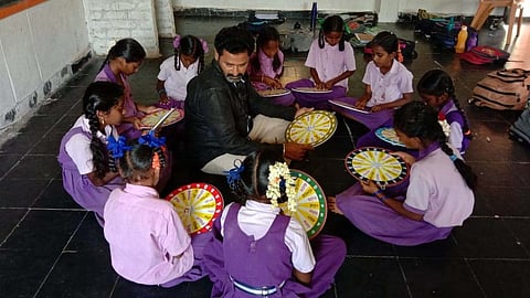 Juturu Tulasidas with students.