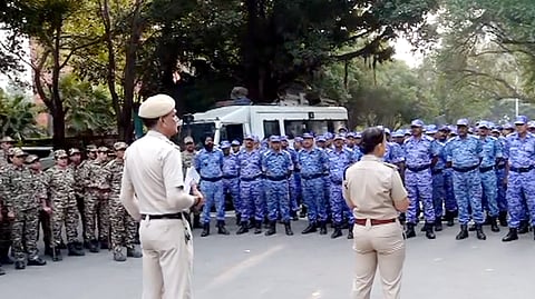 Security personnel stand guard near Jantar Mantar following continued demonstration calls by the Cockroach Janta Party (CJP) demanding the resignation of Chief Election Commissioner (CEC) Gyanesh Kumar in New Delhi, Sunday, Oct. 11, 2026. 