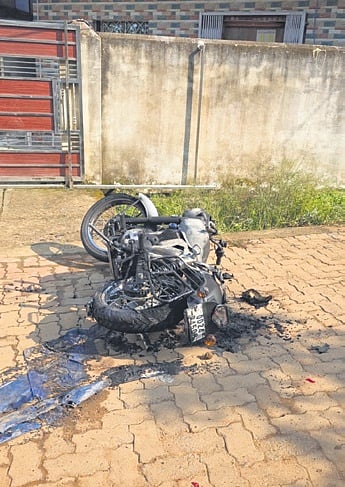 The motorcycle torched after the clash