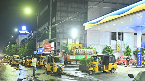 Autorickshaws queue up for CNG at a fuel outlet on Anna Salai. 