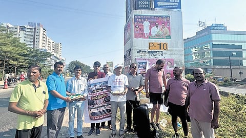 Commuters stage protest over the prolonged delay of Suchitra-Medchal flyover on Sunday. The NH-44 stretch continues to face traffic congestion
