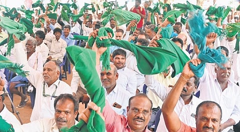 Farmers protest demanding an additional `800 per tonne for sugarcane in Karnataka and fulfilment of various other demands, at Freedom Park in Bengaluru on Monday.
