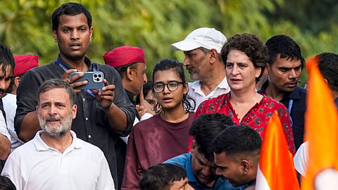 Congress leaders Rahul Gandhi, Priyanka Gandhi Vadra, All India Students' Association (AISA) National President Neha Bora and others during 'March for Democracy' by INDIA bloc leaders, towards the Supreme Court, to file a petition against Chief Election Commissioner Gyanesh Kumar and 'vote chori', at Barakhamba road, in New Delhi, Monday, Oct. 12, 2026.