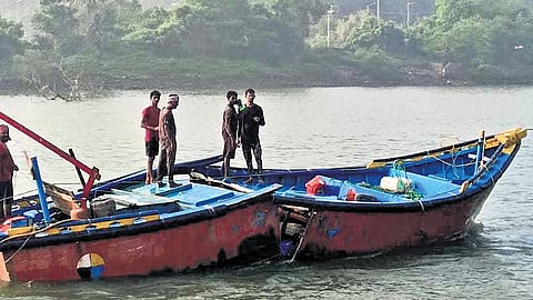 Fishermen stranded on the broken boat near Mahanadi river mouth 