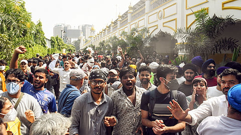 Protesters raise slogans inside Bangla Sahib Gurudwara during a protest against Chief Election Commissioner Gyanesh Kumar in New Delhi on Saturday, Oct 10, 2026.