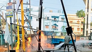 A firefighter dousing the blaze 