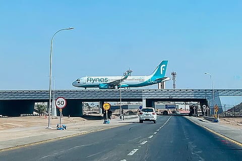 A Flynas plane lands at King Khalid International Airport in Riyadh on September 19, 2026.