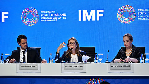 IMF Chief Economist Silvana Tenreyro (C) speaks next to IMF Research Department Deputy Director Petya Koeva Brooks (R) and IMF Communications Officer Jose Luis De Haro (L) during the World Economic Outlook press briefing at the Annual Meetings of the International Monetary Fund (IMF) and the World Bank Group (WBG) at the Queen Sirikit National Convention Center (QSNCC) in Bangkok on October 13, 2026. 