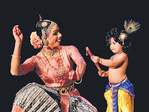 Three-year-old Zabiya during a performance with her mother ZIya Paval