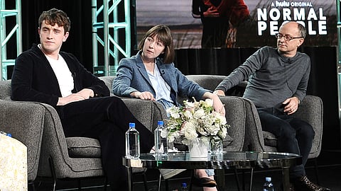 FILE - From left, Paul Mescal, Sally Rooney and Ed Guiney participate in Hulu's "Normal People" panel during the Winter 2020 Television Critics Association Press Tour on Jan. 17, 2020, in Pasadena, Calif.