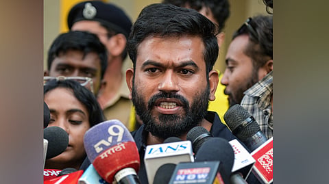 Cockroach Janta Party (CJP) founder Abhijeet Dipke speaks to the media after CJP leader Saurav Das and Ashutosh Ranka were sent to five-day judicial custody in Nagpur, Wednesday, Oct. 14, 2026.