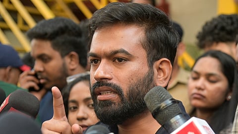 Cockroach Janta Party (CJP) founder Abhijeet Dipke speaks to the media after CJP leader Saurav Das and others being sent to 5-day judicial custody, in Nagpur, Wednesday, Oct. 14, 2026.