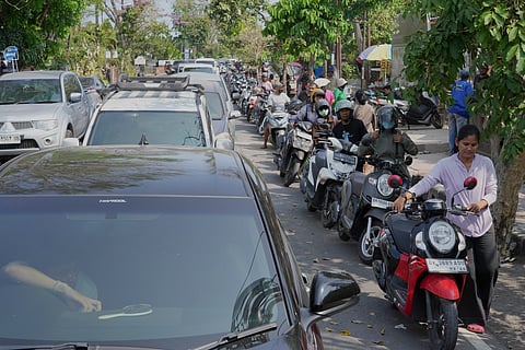 People queue at a gas station amid a fuel shortage in Denpasar, Bali, Indonesia, Wednesday, Oct. 14, 2026.