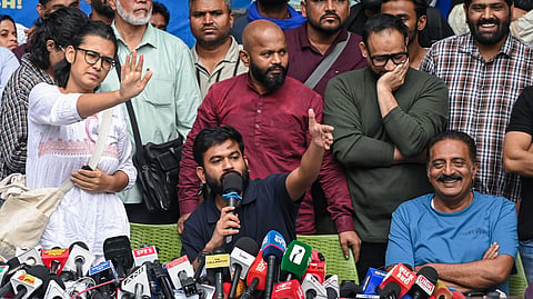 Cockroach Janta Party (CJP) Founder Abhijeet Dipke addresses a press conference at the Press Club, in New Delhi on Thursday. All India Students' Association (AISA) National President Neha Bora also present.