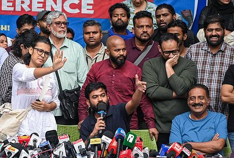 Cockroach Janta Party (CJP) Founder Abhijeet Dipke addresses a press conference at the Press Club, in New Delhi on Thursday. All India Students' Association (AISA) National President Neha Bora and Actor Prakash Raj also present.