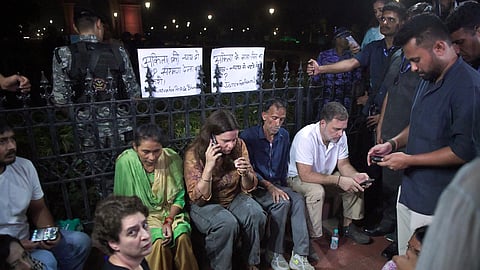 Lok Sabha LoP Rahul Gandhi and Congress MP Priyanka Gandhi Vadra meet the parents of Ankita Bhandari, protesting against the appointment of BJP leader Dushyant Kumar Gautam as Sikkim Governor over his alleged involvement in the 2022 Ankita Bhandari murder case at India Gate, in New Delhi on Wednesday. Social activist Yogita Bhayana also present. 