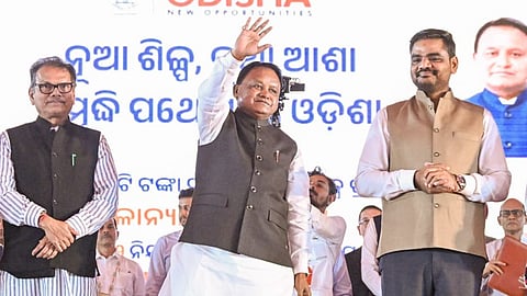 Chief Minister Mohan Charan Majhi flanked by Industries minister Sampad Charan Swain and Jajpur MP Rabindra Narayan Behera, at Kalinganagar in Jajpur district.