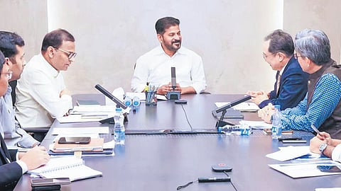 Chief Minister A Revanth Reddy speaks to the Hyundai Motor India Engineering representatives in Hyderabad on Friday.