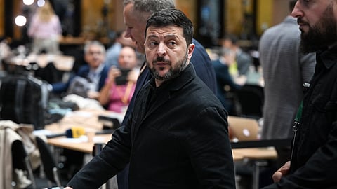 Ukraine's President Volodymyr Zelensky leaves after addressing a press conference as part of a European Union summit at the EU headquarters in Brussels on October 16, 2026.