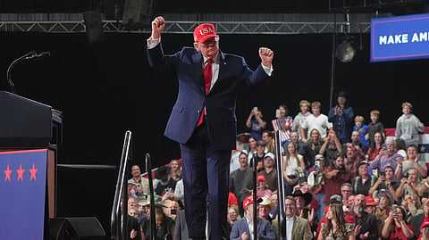 US President Donald Trump dances at a campaign rally at Majestic Valley Arena, Wednesday, Oct. 14, 2026, in Kalispell, Mont.