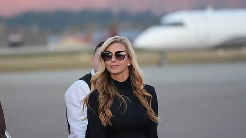 White House press secretary Katie Zacharia arrives with President Donald Trump at Glacier Park International Airport, Wednesday, Oct. 14, 2026, in Kalispell, Mont.