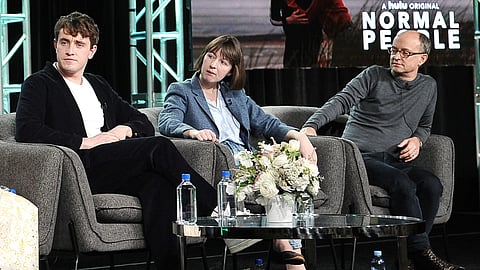 From left, Paul Mescal, Sally Rooney and Ed Guiney participate in Hulu's "Normal People" panel during the Winter 2020 Television Critics Association Press Tour on Jan. 17, 2020, in Pasadena, Calif.