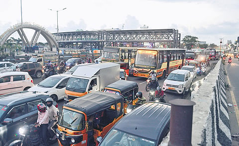 Traffic near Kilambakkam on Friday evening. A total of 2,546 government buses were operated from Chennai, transporting 1,01,840 people on that day 