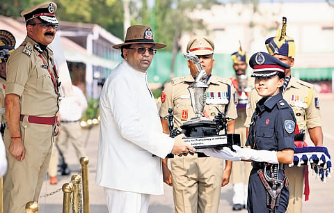 Union Home Secretary Govind Mohan awards trophy to a trainee IPS officer
