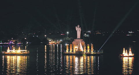 Fireworks light up the sky; Bathukamma floating (right) at Hussainsagar during the Saddula Bathukamma celebrations in Hyderabad on Sunday 