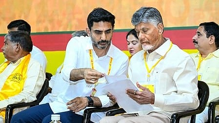 Mangalagiri: Andhra Pradesh Chief Minister N. Chandrababu Naidu and state minister Nara Lokesh during the swearing-in ceremony of the latter as Telugu Desam Party (TDP) National Working President during the oath-taking ceremony of the party’s national and state working committees, in Mangalagiri on Wednesday, April 29, 2026.