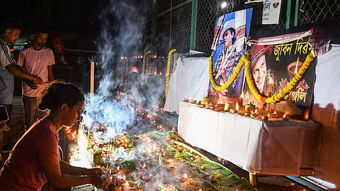In this file photo from Sep. 19, 2026, people light earthen lamps (diyas) to pay tribute to the late singer Zubeen Garg on his first death anniversary in Guwahati.