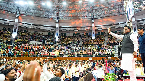 CM Mohan Charan Majhi addressing elected student representatives at a massive meeting at Indoor Stadium in Cuttack on Sunday.
