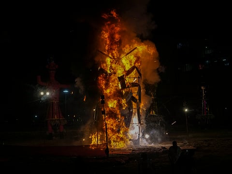 A cockroach effigy is set ablaze at Ramlila ground as part of Dussehra festival celebrations, in New Delhi, Tuesday, Oct. 20, 2026. 